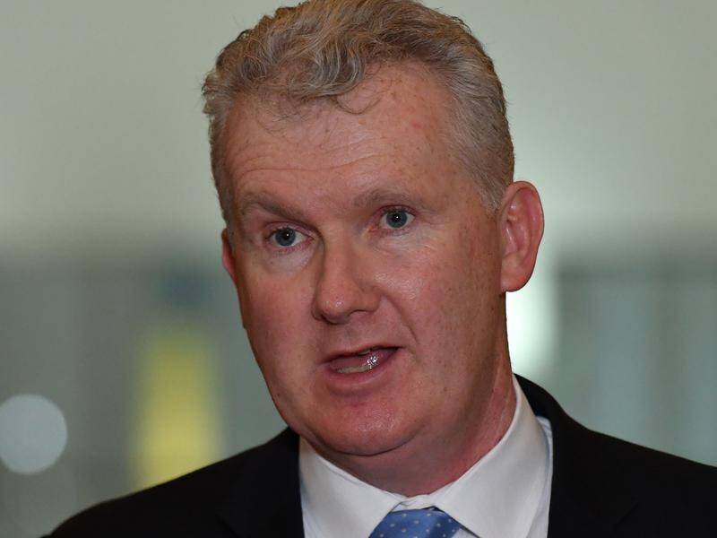 "People who try to come by boat get turned around and sent back," Labor's Tony Burke said.