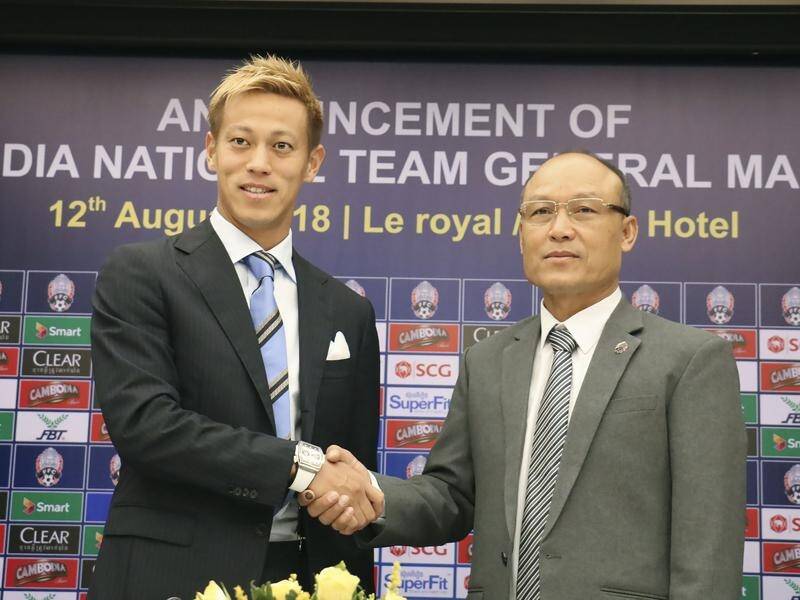 Melbourne Victory is OK with star Keisuke Honda (L) being general manager of the Cambodian team.