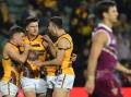 Hawthorn pulled off a stunning win over high-flying Brisbane in the AFL.
