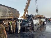 Six bus passengers survived the fiery explosion following the collision with an oil tanker. (AP PHOTO)