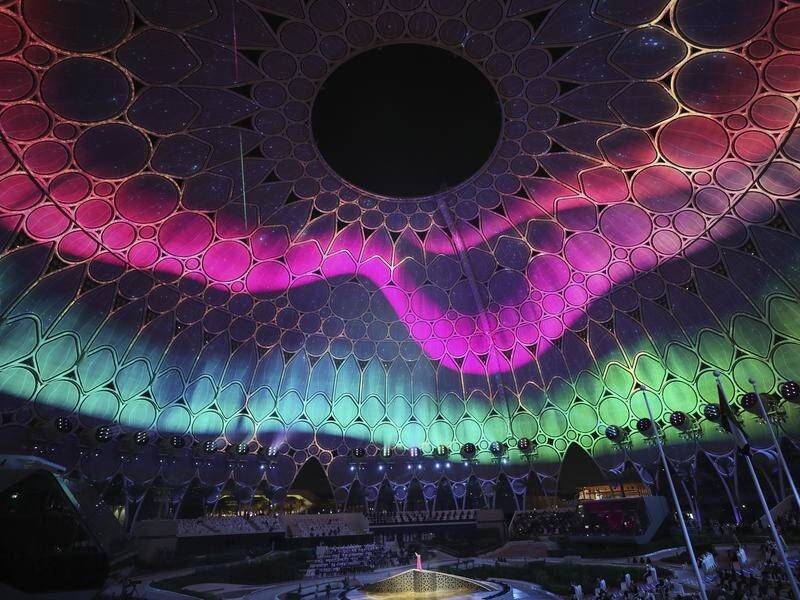 Dubai has opened Expo 2020 in an extravagant ceremony that bathed the site's dome in light.