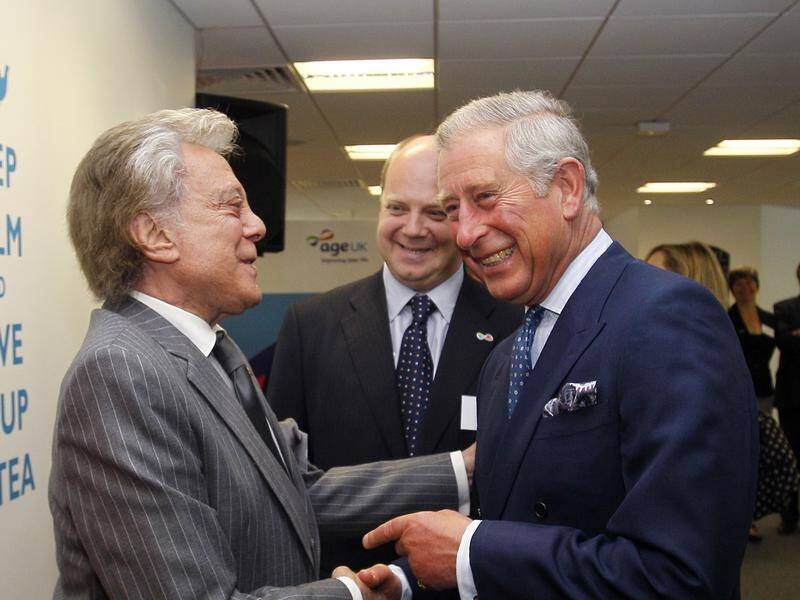 Veteran English entertainer Lionel Blair (left, with Prince Charles) has died at 92.