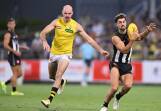 Josh Daicos (r) was one of Collingwood's stars in the 30-point win over Richmond at Ikon Park. (James Ross/AAP PHOTOS)