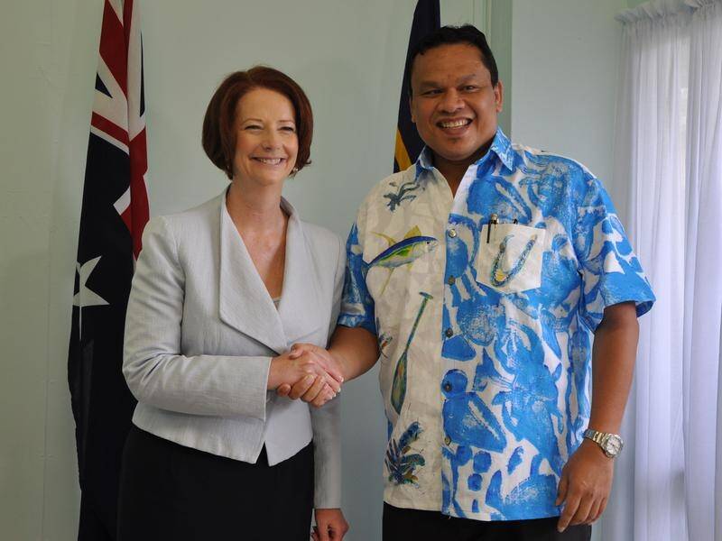 Sprent Dabwido(R) and Julia Gillard(L)in 2012 agreed to use Nauru for refugees' offshore processing.