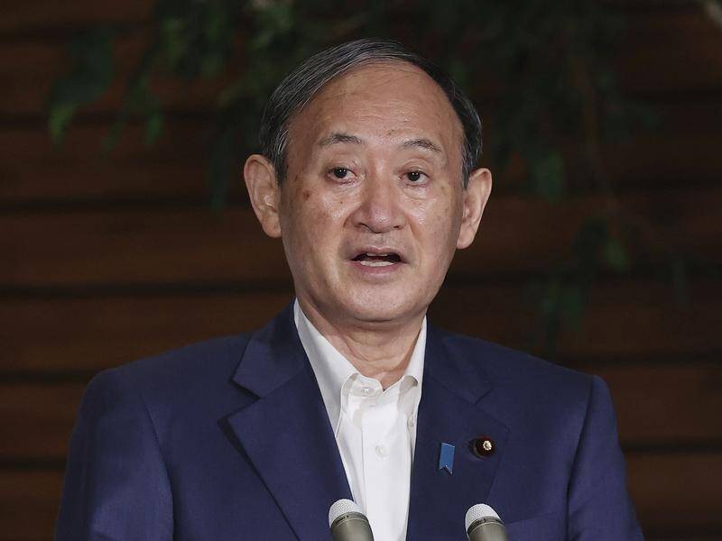 Japan has donated the "third largest provision of vaccine in the world", PM Yoshihide Suga says.