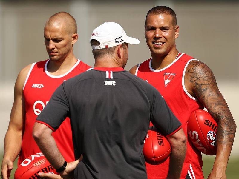 Injuries to Sam Reid and Lance Franklin (r) have hampered their AFL pre-season training schedules.