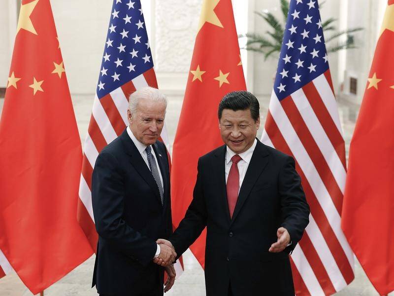 Joe Biden met Chinese President Xi Jinping in December 2013 in Beijing.