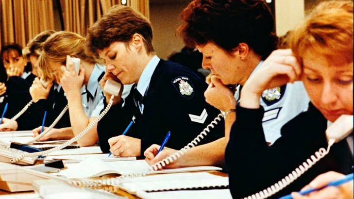 Policewomen take calls during a special phone-in on sexual assault in 1993. Photo: Supplied
