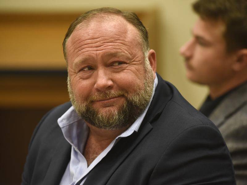 Alex Jones has claimed for years that the 2012 Sandy Hook massacre was staged by the US government. (AP PHOTO)