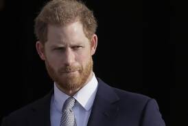 Prince Harry has accepted a substantial settlement in the phone hacking case against the Mirror (AP PHOTO)