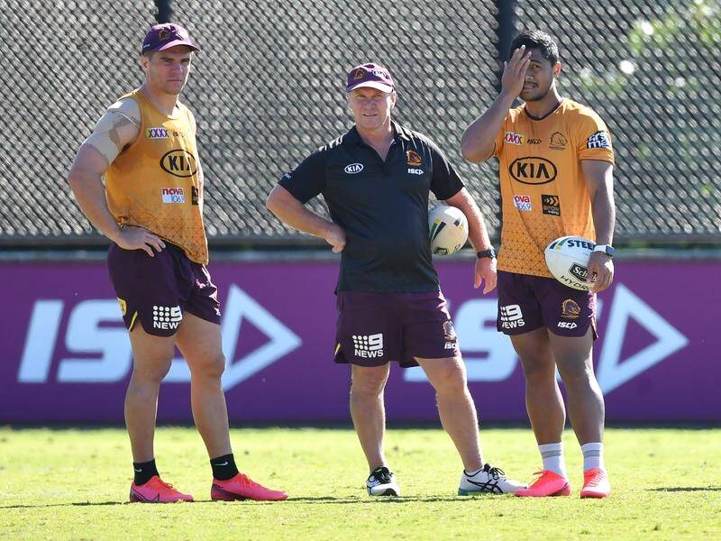 Allan Langer (c) is one of three Broncos staff who will have to undergo COVID-19 testing.