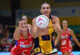 Recruit Liz Watson (R) helped lead the Lightning to a 16-point defeat of the Swifts. (Jono Searle/AAP PHOTOS)
