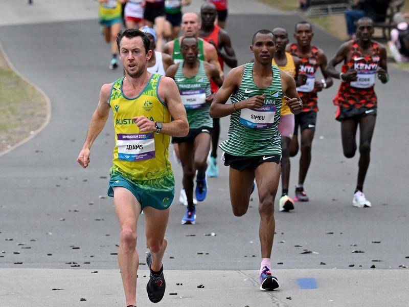 Liam Adams took it right up to the African stars in the Commonwealth marathon. (Dean Lewins/AAP PHOTOS)