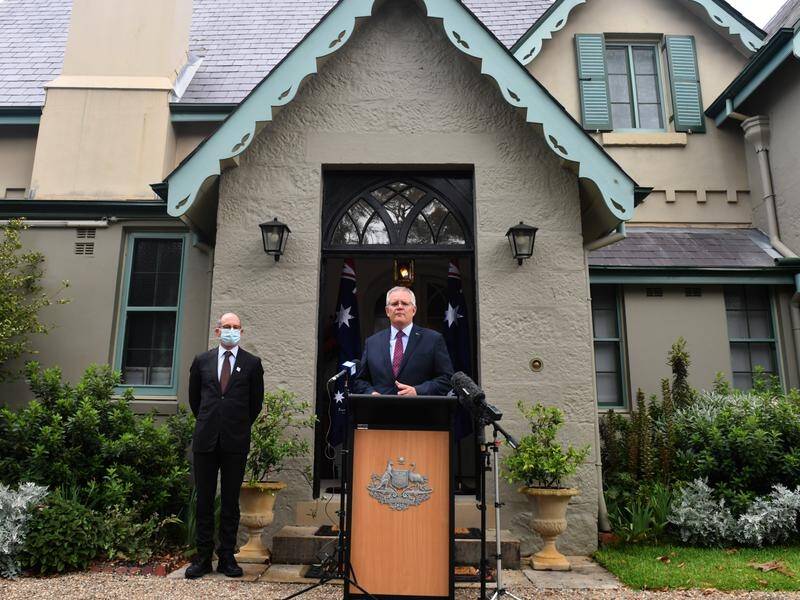 Scott Morrison is monitoring for symptoms after a COVID case at a Kirribilli House press conference.