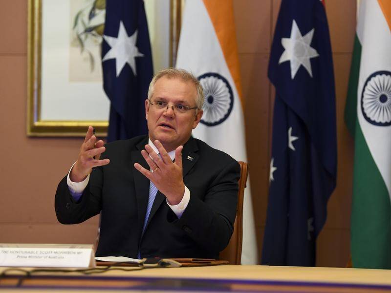 Scott Morrison says all direct passenger flights from India are being suspended until May 15.