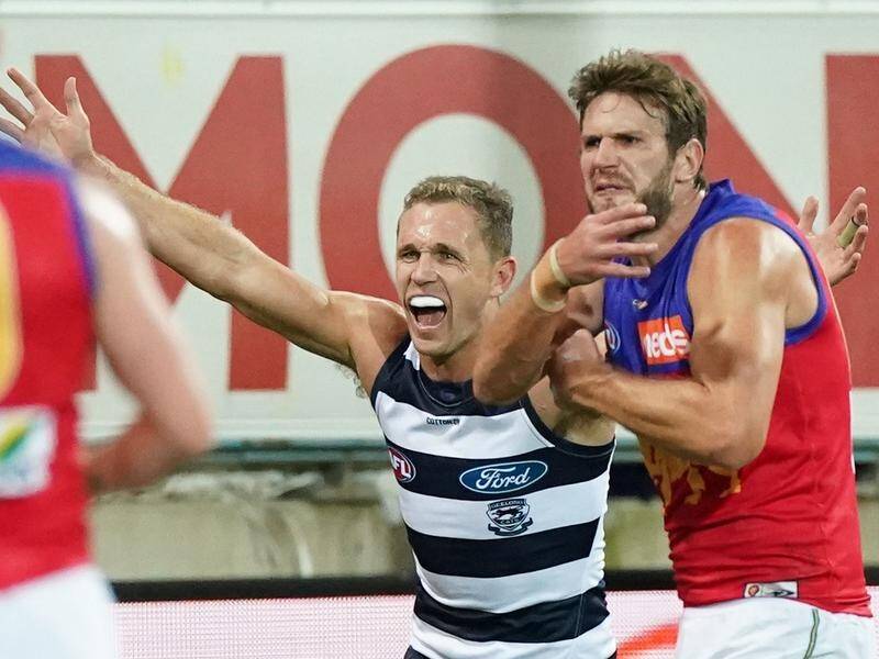 Joel Selwood celebrates after kicking a goal in Geelong's thrilling one-point AFL win over Brisbane.