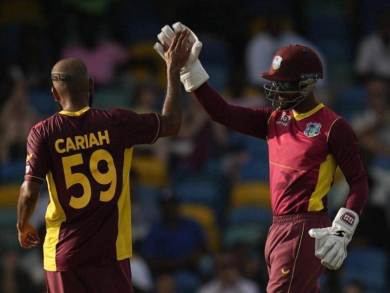 Yannic Cariah celebrates his first ODI wicket for West Indies against New Zealand in Barbados. (AP PHOTO)