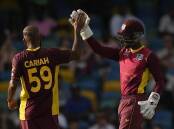 Yannic Cariah celebrates his first ODI wicket for West Indies against New Zealand in Barbados. (AP PHOTO)