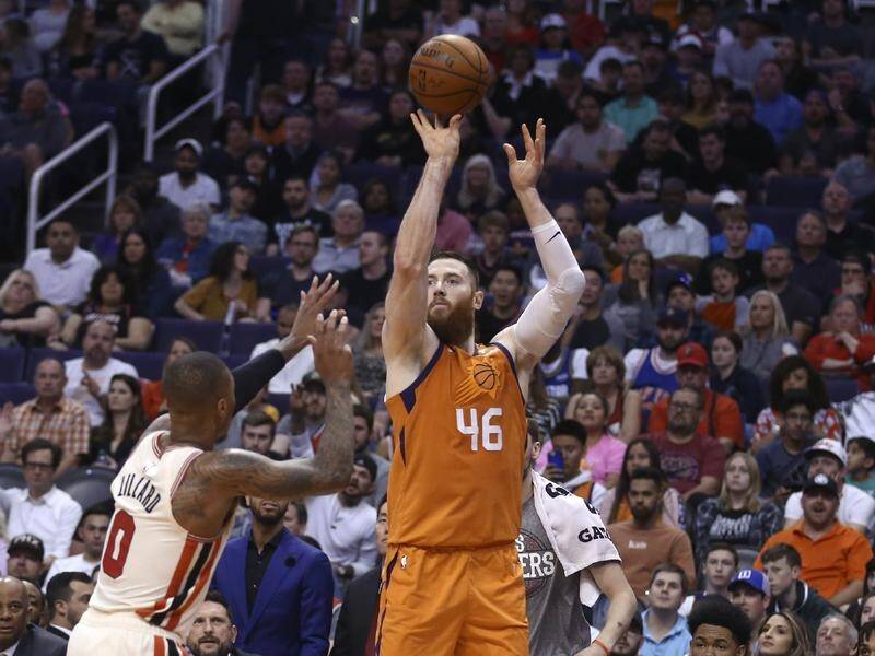 Phoenix Suns' Aron Baynes spent more than a month at his home after being hit by COVID-19.