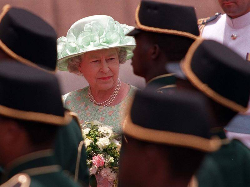 Queen Elizabeth II's legacy in former British colonies in Africa and Asia is complicated. (AP PHOTO)