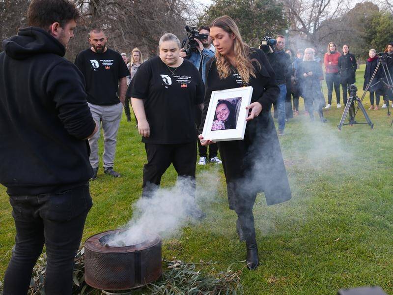 Tanya Day's family held a smoking ceremony before the inquest into her death in police custody.