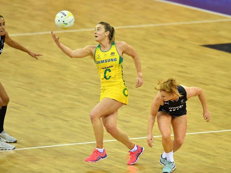 Liz Watson (left) of the Diamonds gets past New Zealand's Sam Sinclair during the Constellation Cup.