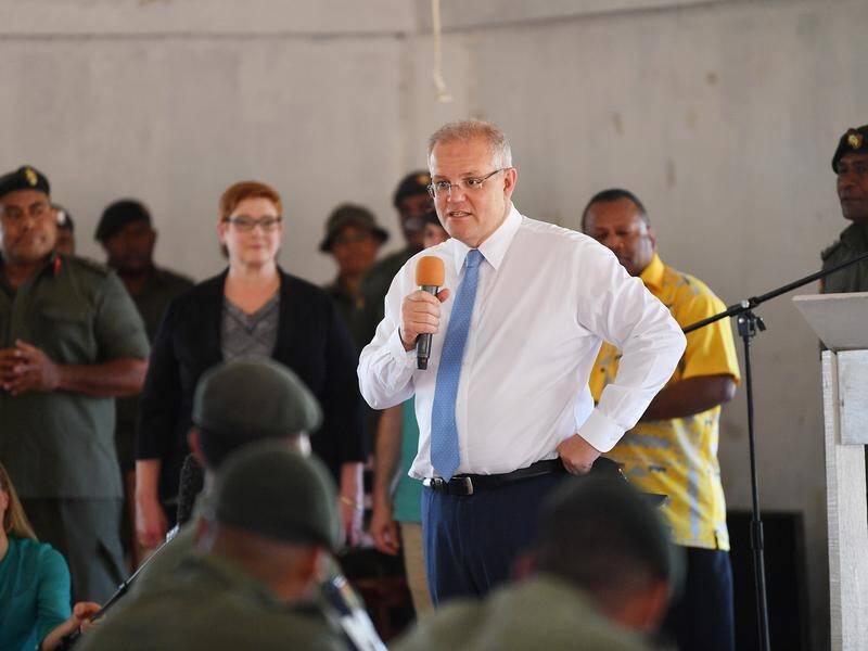 Scott Morrison has avoided overreacting to a clash between his minister Peter Dutton and China.