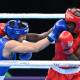 Kaye Scott (l) was one two Australian boxers to progress to a gold medal fight in Birmingham (Darren England/AAP PHOTOS)