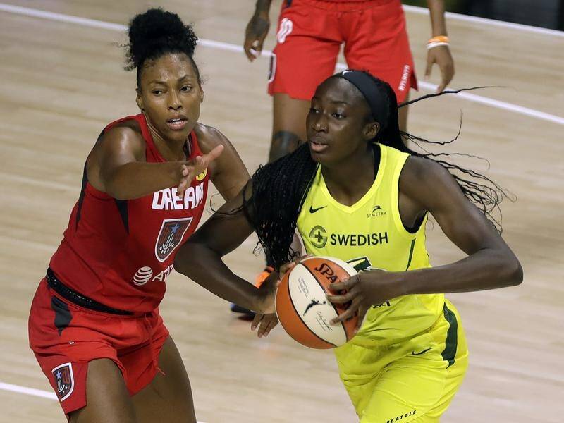 Ezi Magbegor (r) has played in all 20 Seattle Storm WNBA games in this abbreviated season.