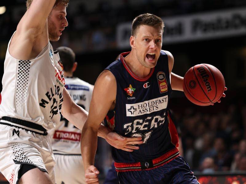 Daniel Johnson has led the Adelaide 36ers to a thrilling NBL win over South East Melbourne Phoenix.