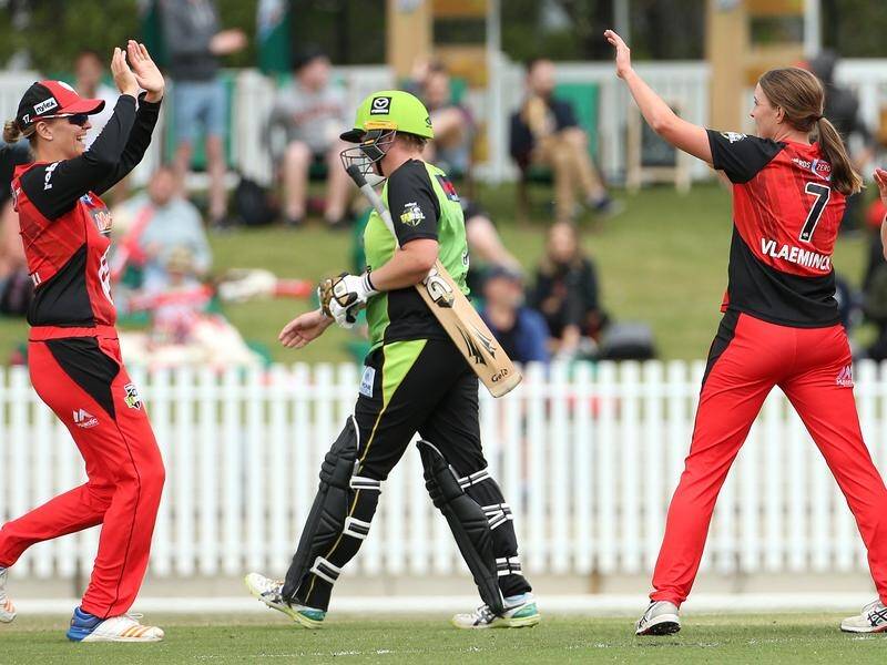 Despite Tayla Vlaeminck's (R) taking four wickets on debut, the Renegades lost to the Thunder.