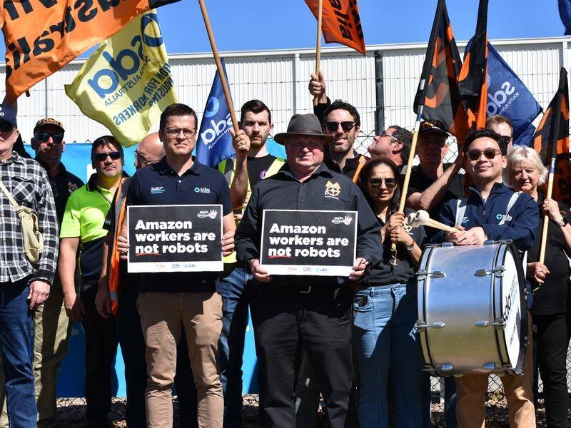 Union members protested against work conditions as Australians snapped up Black Friday bargains. (PR HANDOUT IMAGE PHOTO)