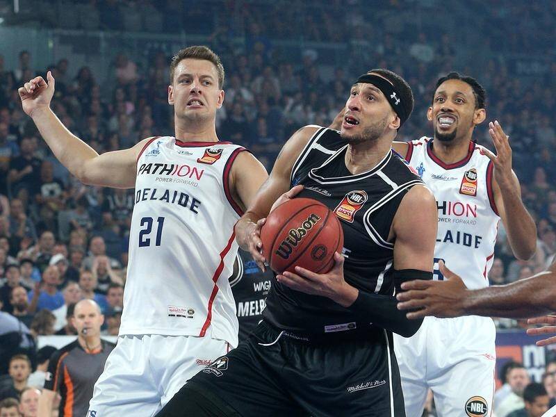 Josh Boone (c) has re-signed for Melbourne United along with fellow US import Casper Ware Jr.