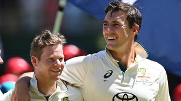 Pat Cummins (r) has named an unchanged first-Test side to face NZ, with Steve Smith (l) at opener. (Darren England/AAP PHOTOS)