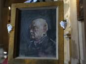Churchill is caught in a moment of absent-minded thoughtfulness, Sotheby's says of the portrait. (AP PHOTO)