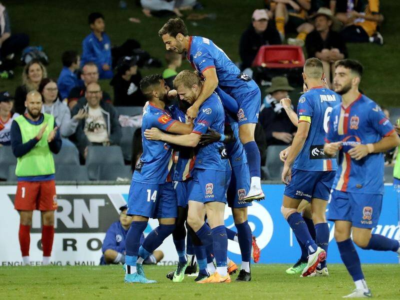 The Newcastle Jets celebrate Valentino Yuel's goal in their big ALM away win at Macarthur.
