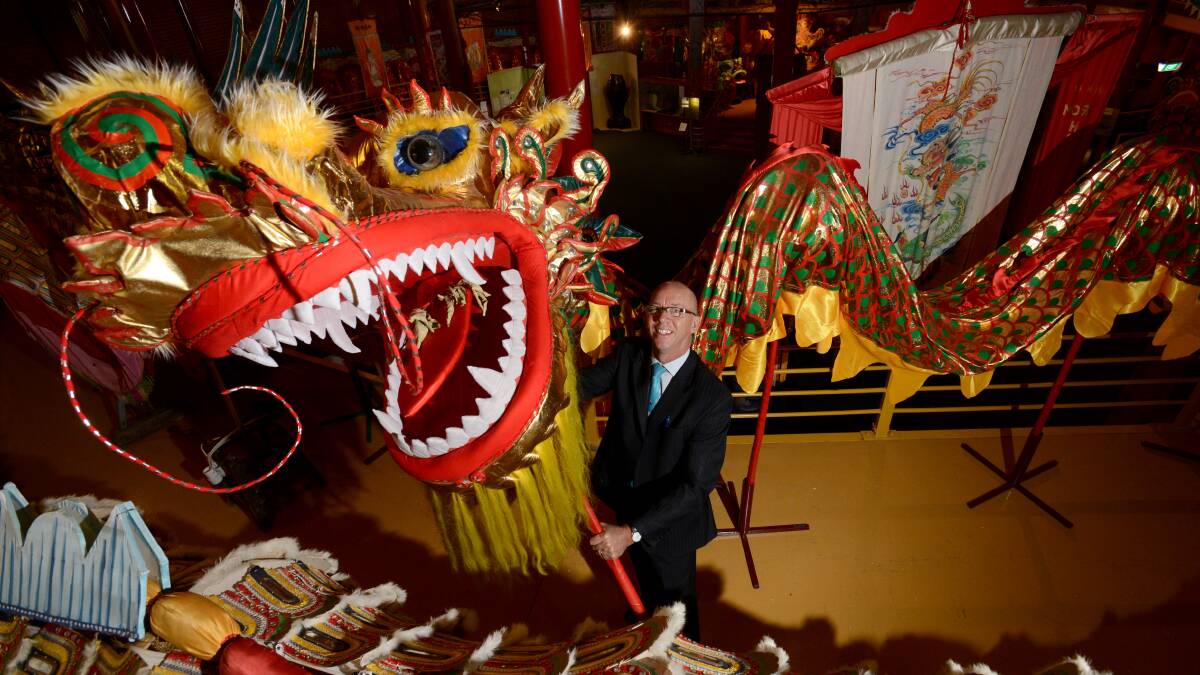 Chinese Dragon head carrier for Sun Loong Doug Lougoon holds smaller dragon Ming Loong. The Bendigo Chinese Association were looking for more volunteers for the easter parade. 

200313
Pb Jim Aldersey