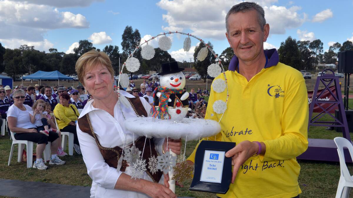 Award for Best Baton
Ann Brisbane of Terri's Troupe Rob Kean, Chairman of Bendigo RFL Committee 
Picture: BRENDAN McCARTHY