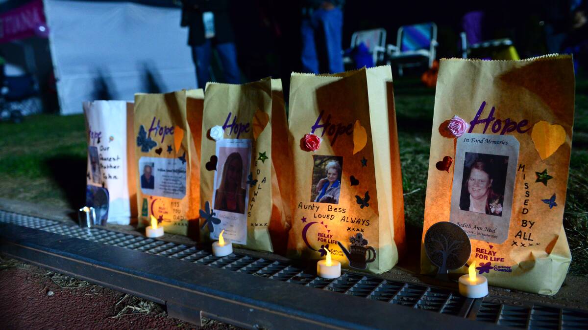 Messages are left on bags and candles placed inside for lost loved ones.

Picture: JIM ALDERSEY
