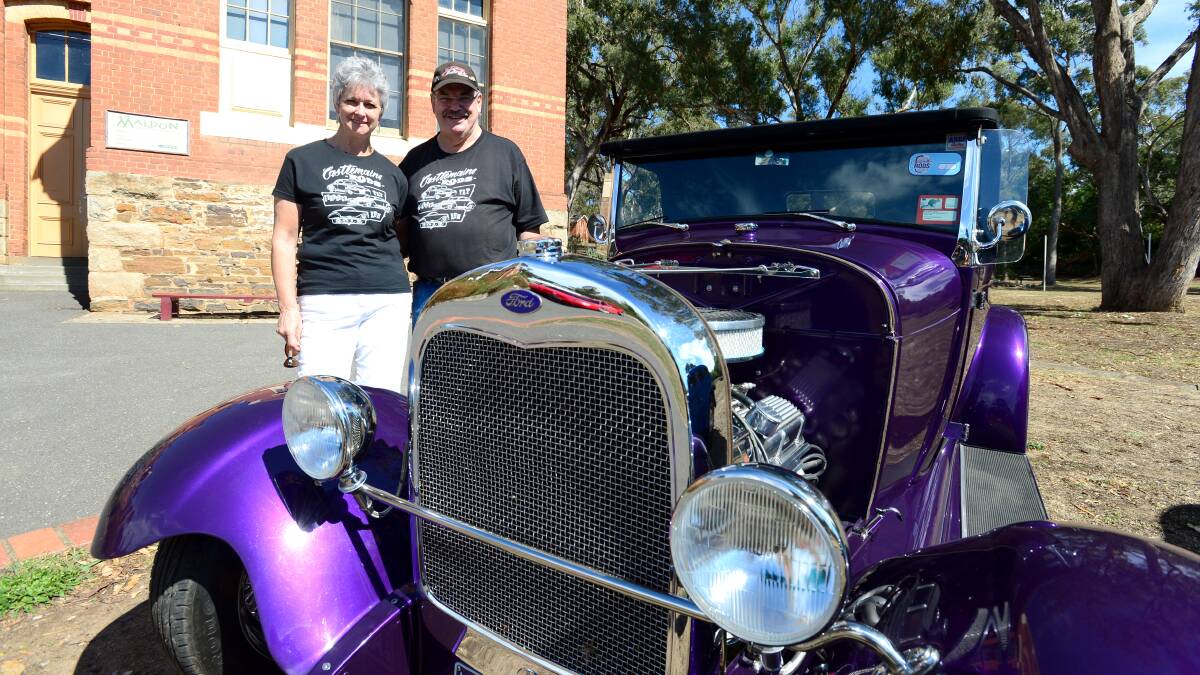 Patty and Garry Ritchie with their 1929 Model A Roadster.

Picture: JIM ALDERSEY