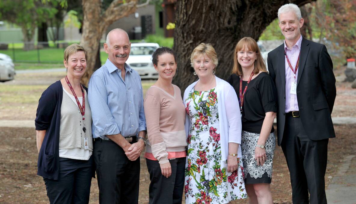 PROUD: Jenny Harriot from Bendigo Health, Keith and Debra Weire with award recipient Jan Waterson, and Sally Harris and Phil Tune from Bendigo Health. Picture: JODIE DONNELLAN 

