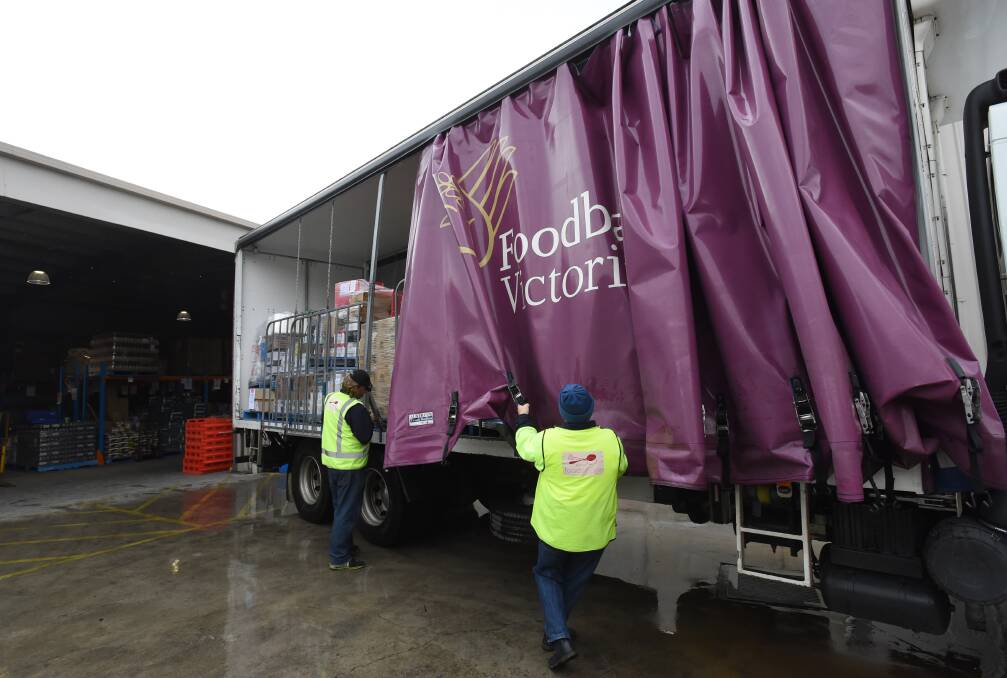 NEEDED: A delivery of food from Foodbank Victoria arrives at the Bendigo's Foodshare warehouse. Picture: JODIE DONNELLAN