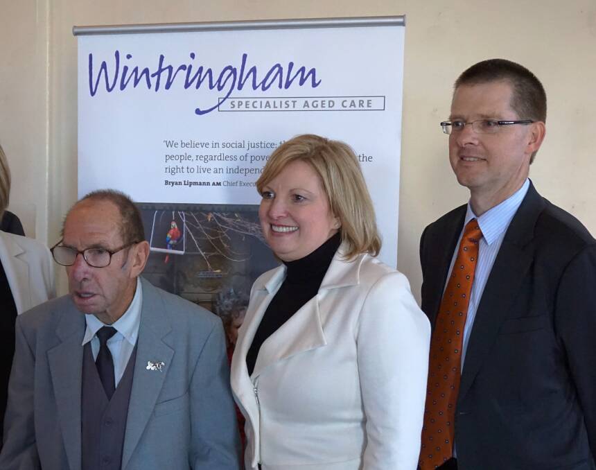 OPENING: Resident Alan Walsh with Minister Wendy Lovell and Michael Deschepper. Picture: CONTRIBUTED  