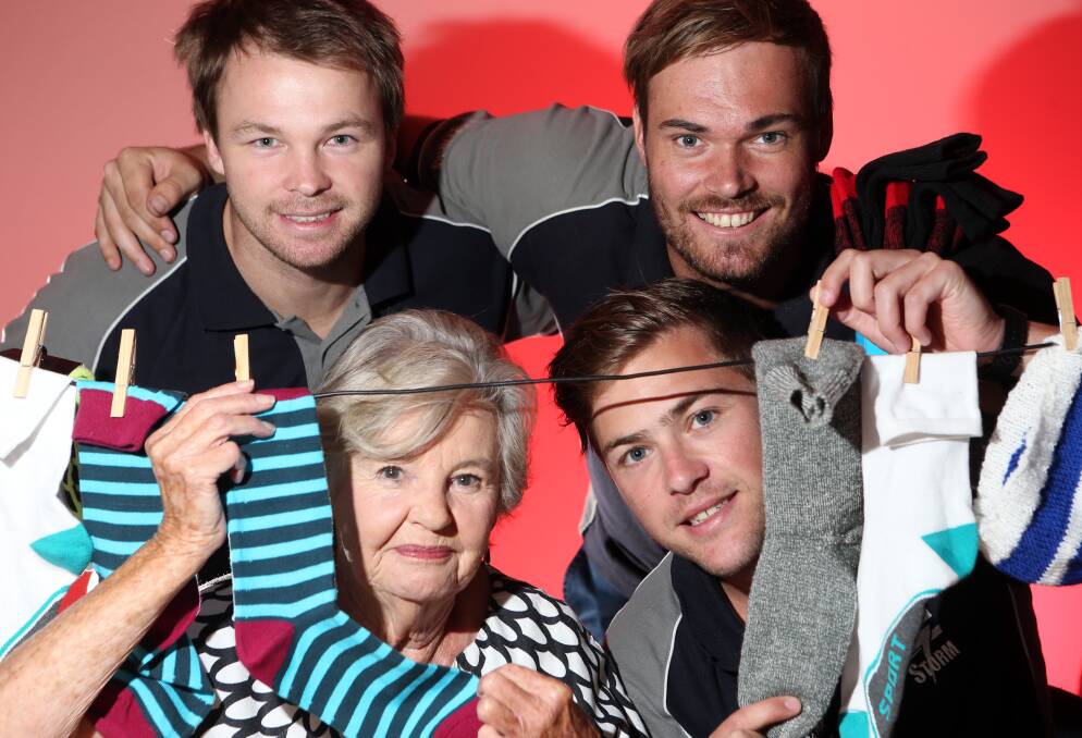 SOCKS: Lorna Wright and with Strath Storms Lachlan Bonney,  Shannon Geary and Jayden Donaldson.
