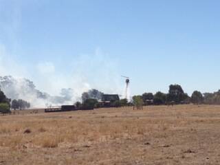 GOOD SAVE: A water bomber at a grass fire in Springvale Road, Lockwood South. Picture: CONTRIBUTED