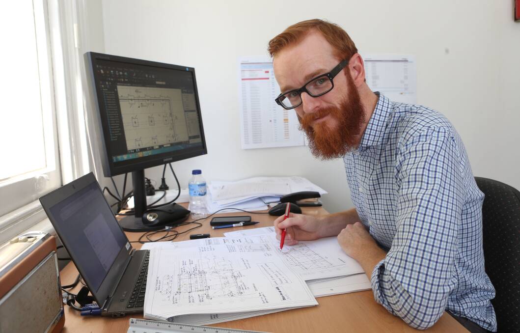 AT WORK: Dave Hogan is the senior structural project engineer for the new hospital. Picture: PETER WEAVING
