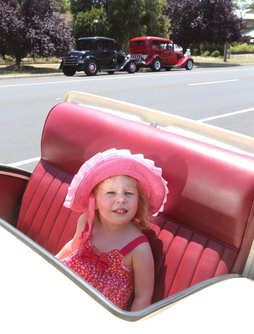 JOY RIDE: Alannah Ralph tests out Neil Stamp's Ford Coupe.