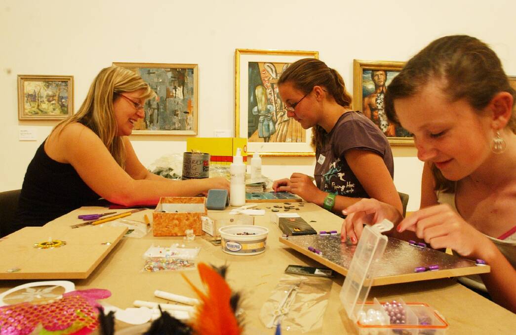 Making Ceramic clocks at Bendigo Art Gallery. l-r Art Instuctor Paula Goble, Emily Bryce and Krystal Davis of Bendigo. Pic Brendan McCarthy 180106