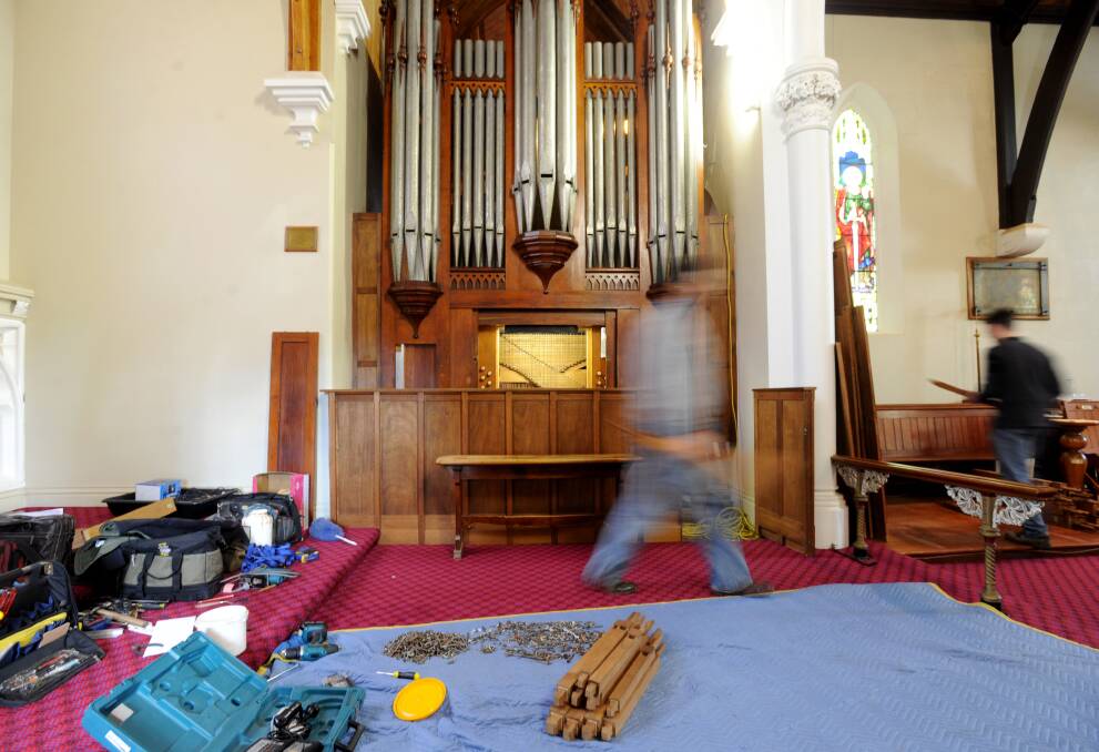 The 135 year old organ at the Inglewood Anglican Church being reparied/cleaned.
Organ builders Phil Henderson and Ian Wakeley from Wakeley Pipe Organs cleaning, tuning and repairing the organ. Picture: JODIE DONNELLAN 