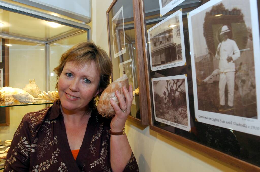 Buda curator Lauretta Zilles with works from the lates exhibition. Picture ; PETER HYETT.